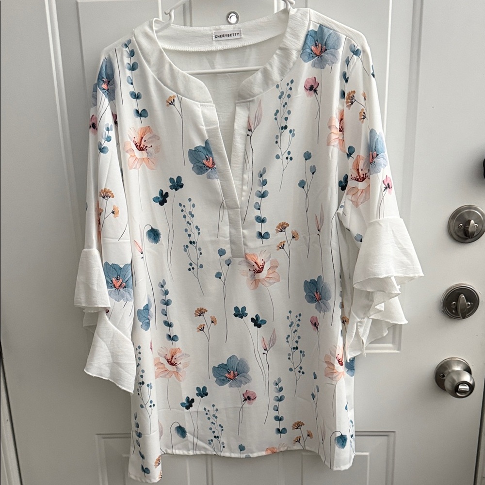 Charming White Floral Blouse with Blue and Pink Details